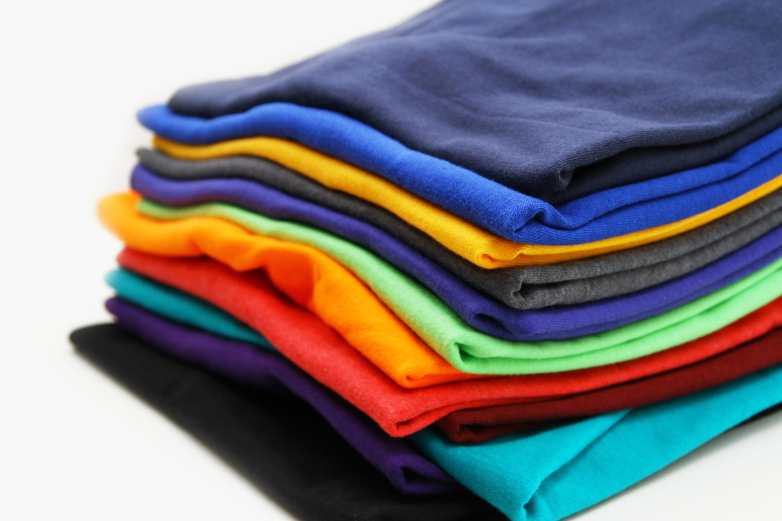 Colorful folded t shirt background